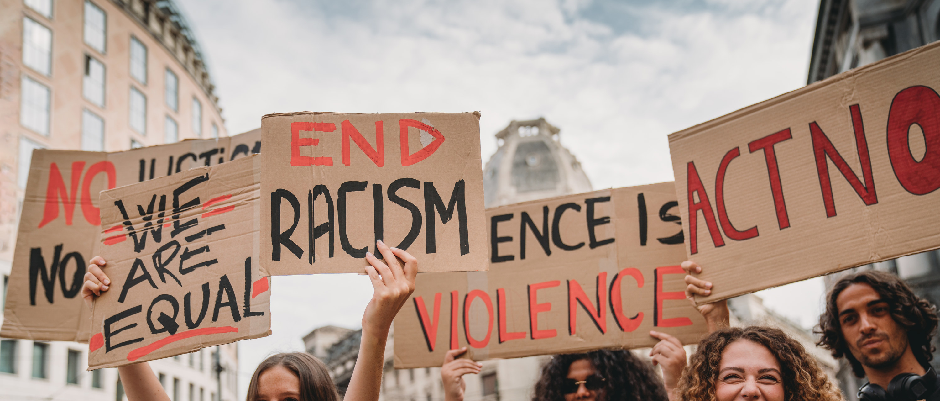 protestors holding signs