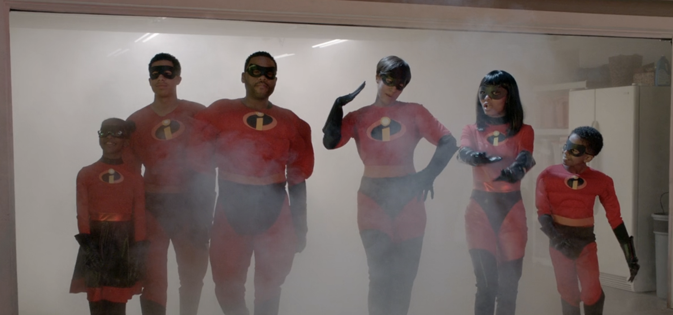 The Johnson family from &quot;Black-ish&quot; struts out a smokey garage wearing The Incredibles superhero costumes