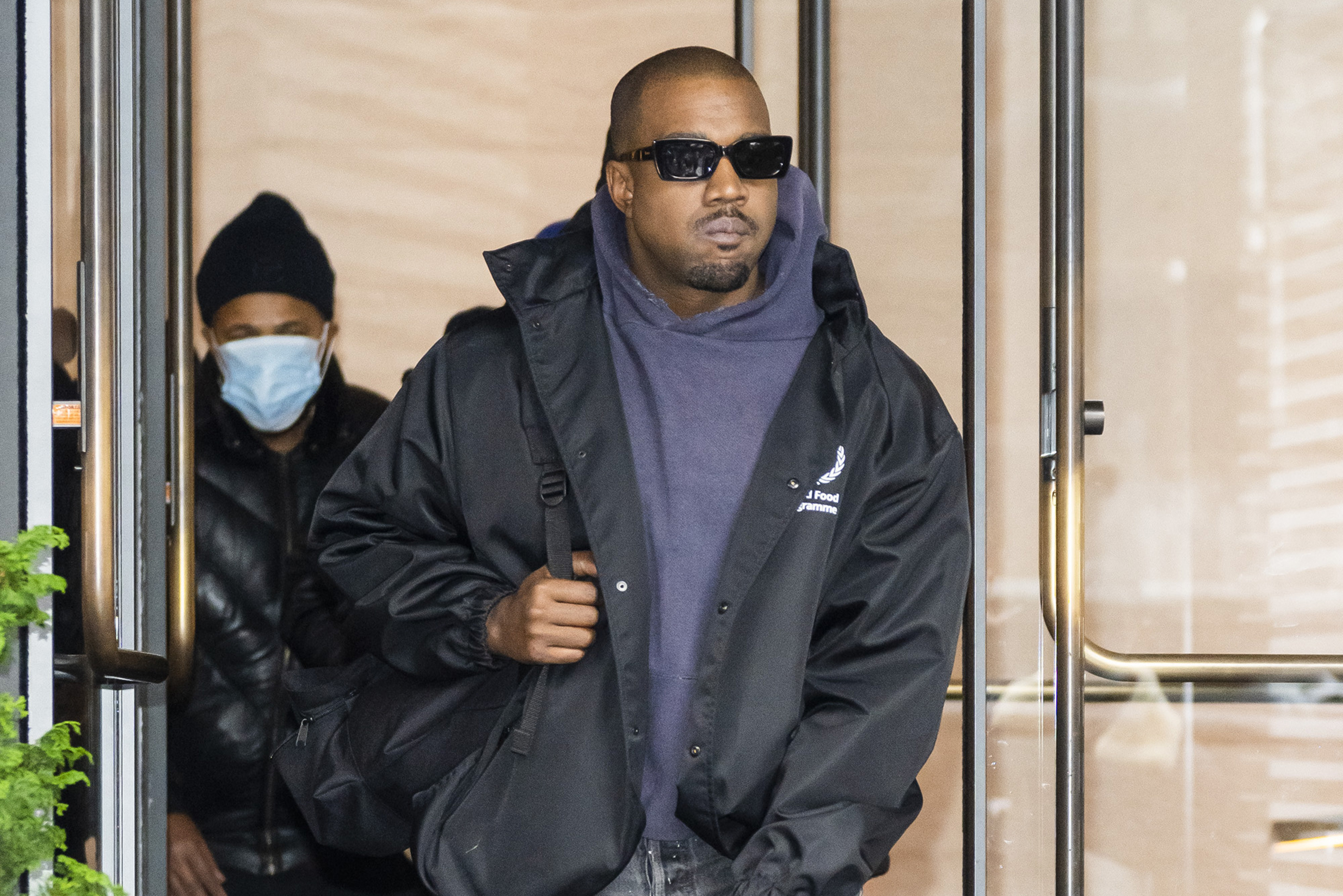 Kanye West leaving a building