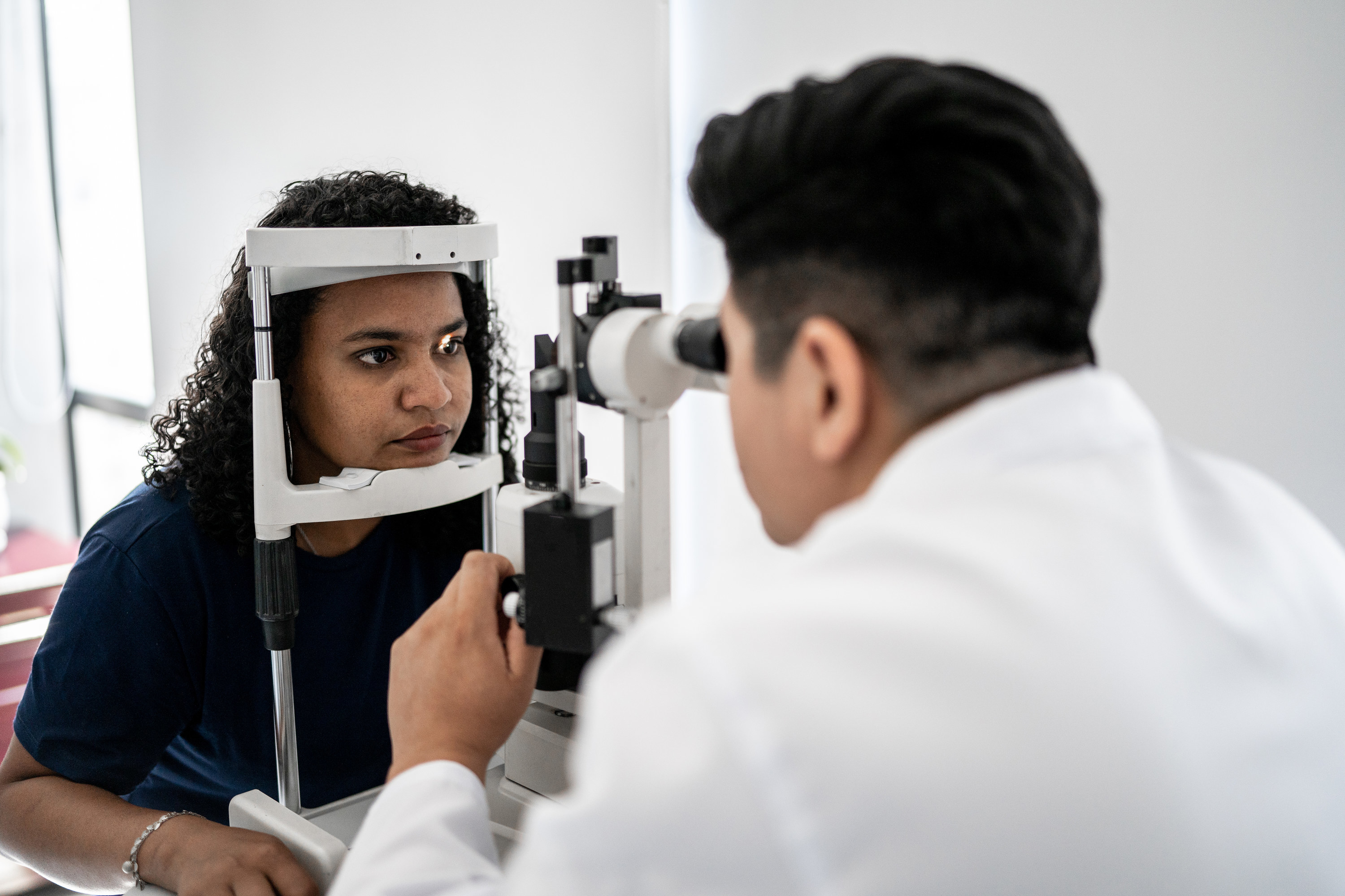 a woman getting her eyes checked