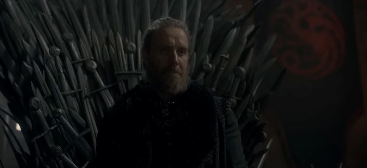 Otto stands in front of the Iron Throne