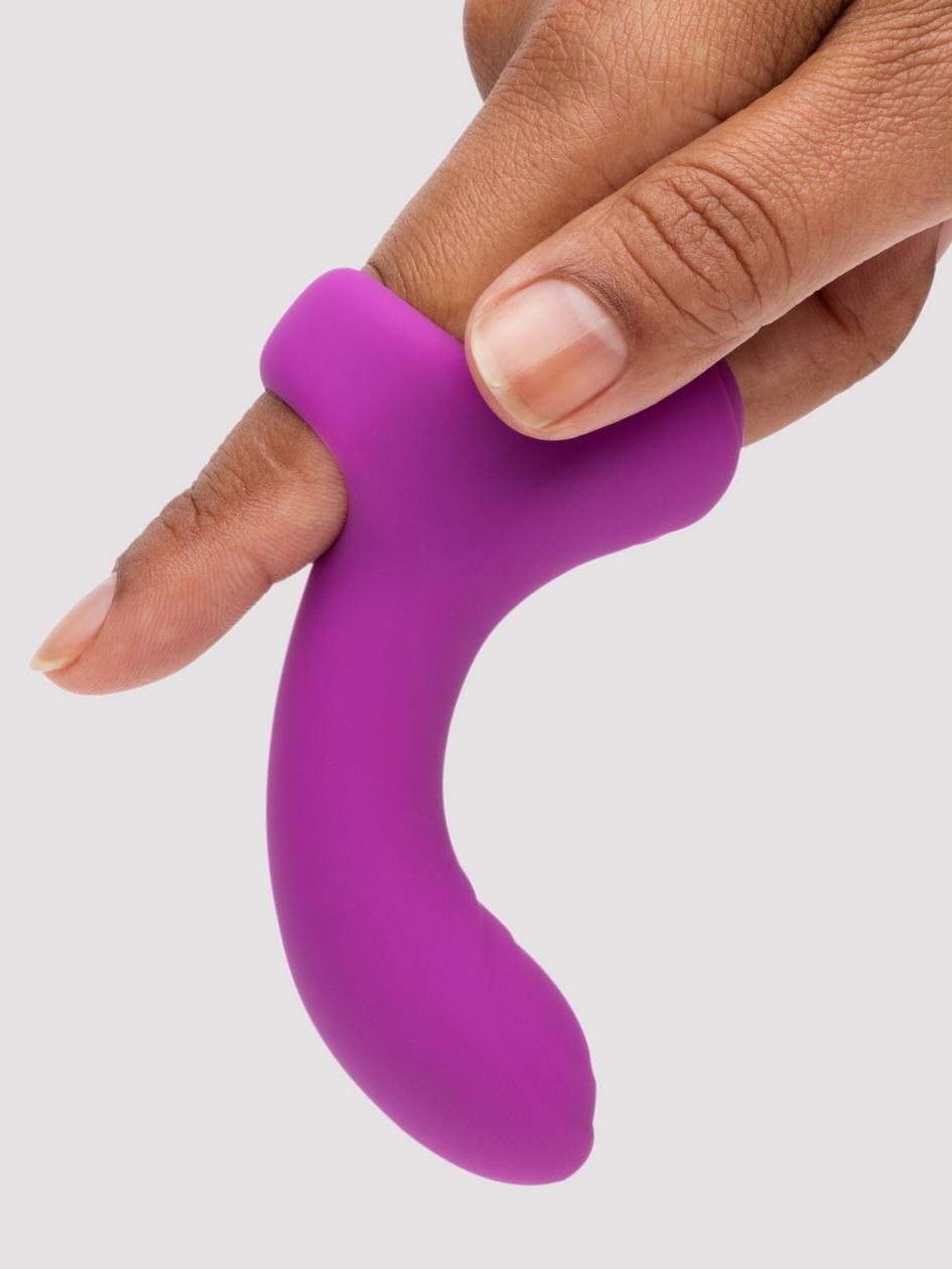 A model wearing the stimulator on their finger