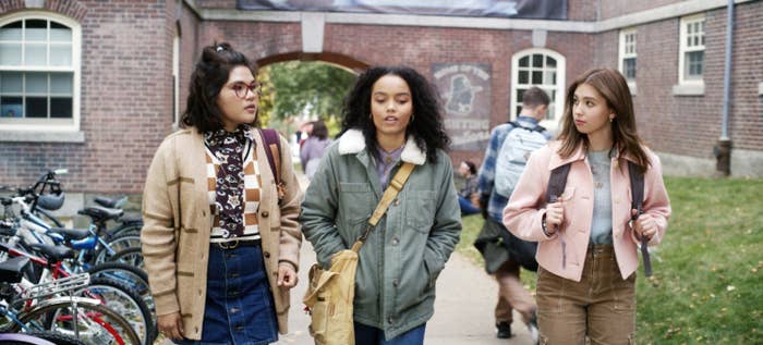 The young Sanderson sisters from Hocus Pocus 2 walking together outside