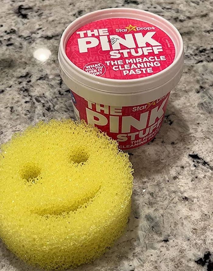 Reviewer&#x27;s Scrub Daddy and The Pink Stuff is shown on a countertop