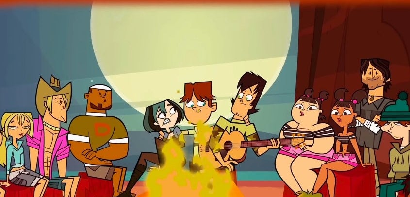 The cast of Total Drama Island sits around a campfire singing