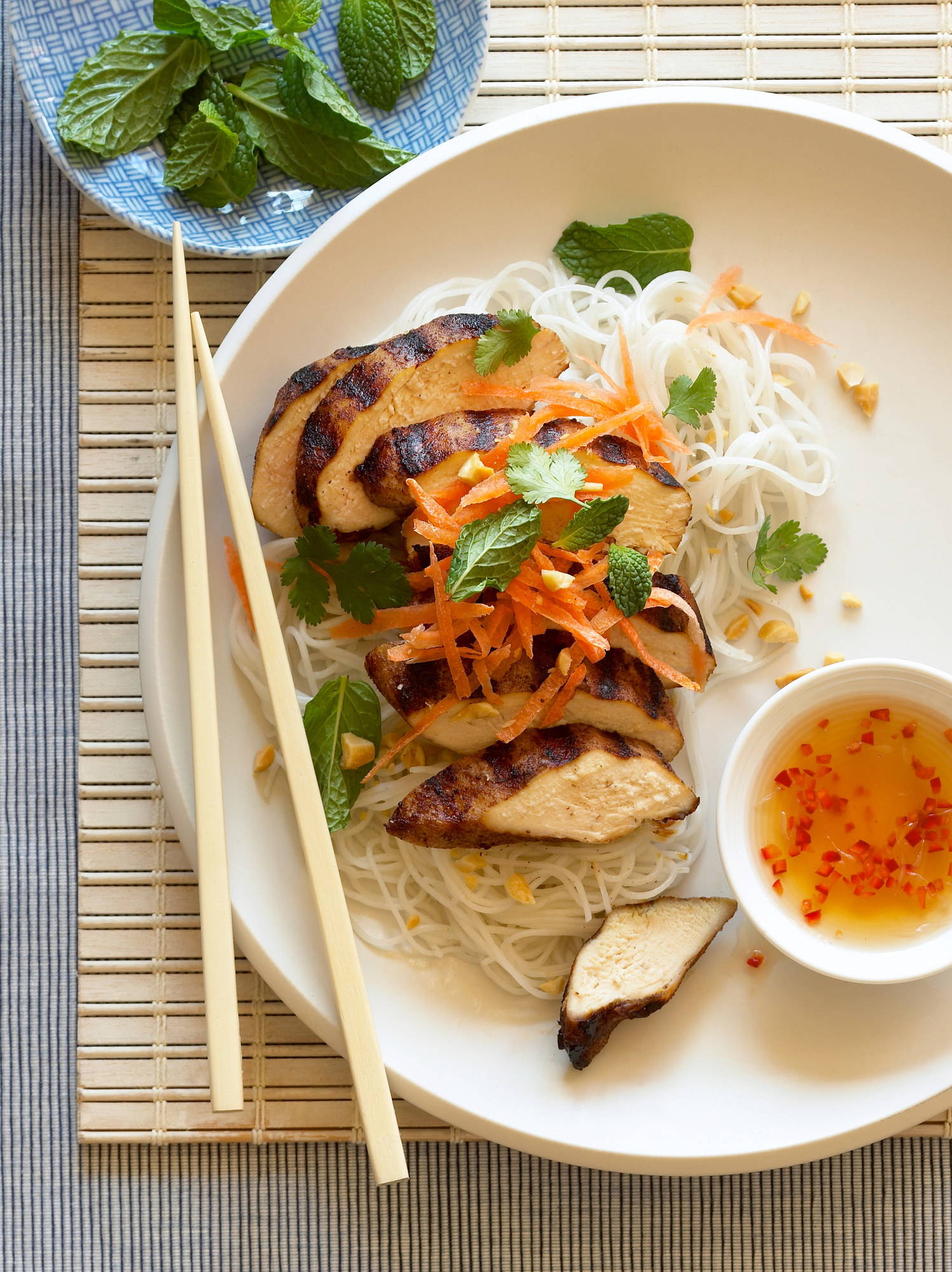 Grilled chicken over rice noodles with fish sauce
