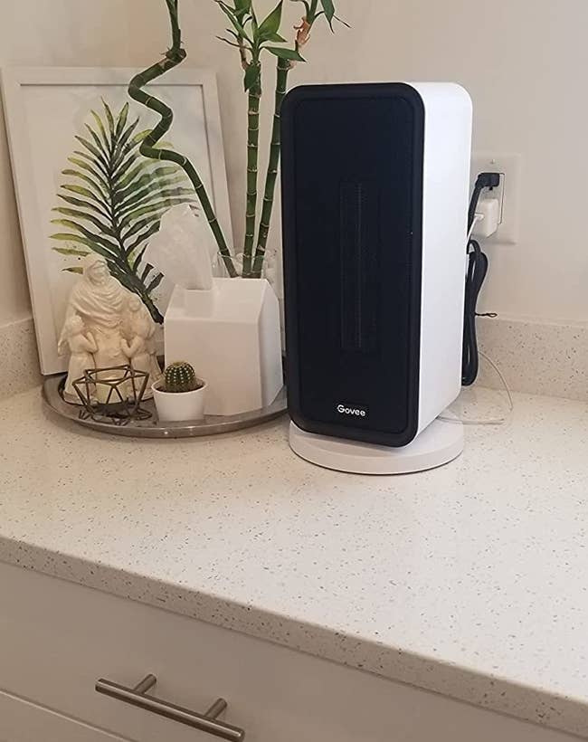 reviewer's space heater sitting atop counter