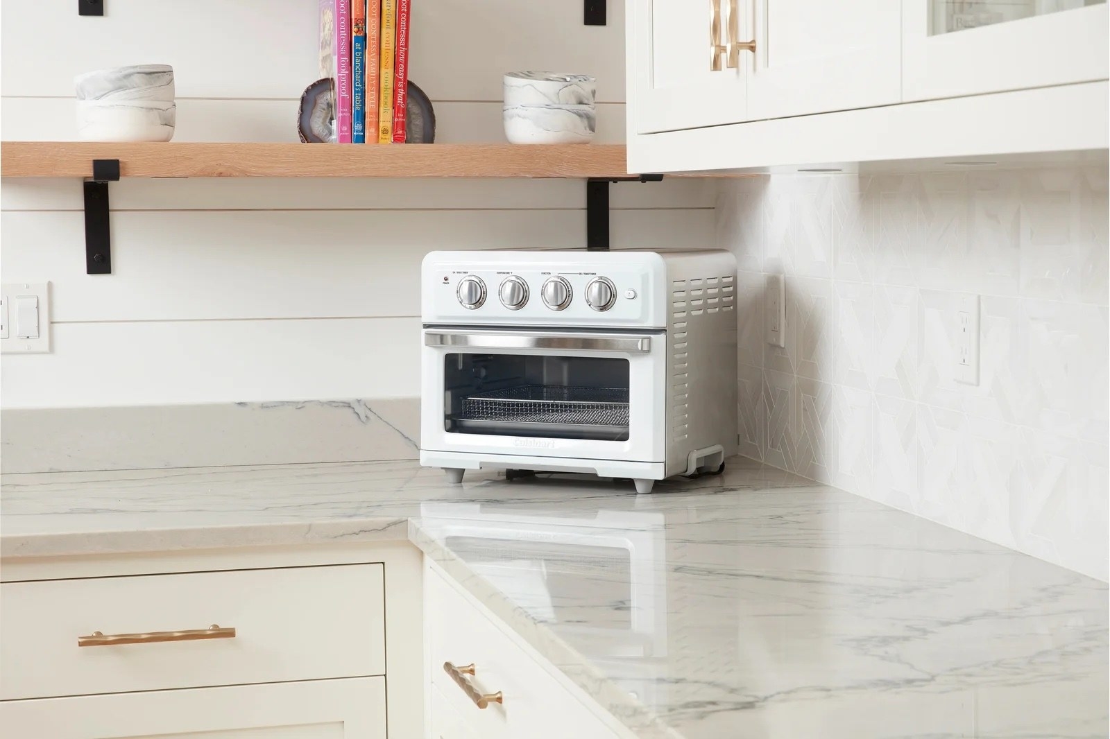 a photo of the white toaster oven air fryer on a kitchen counter