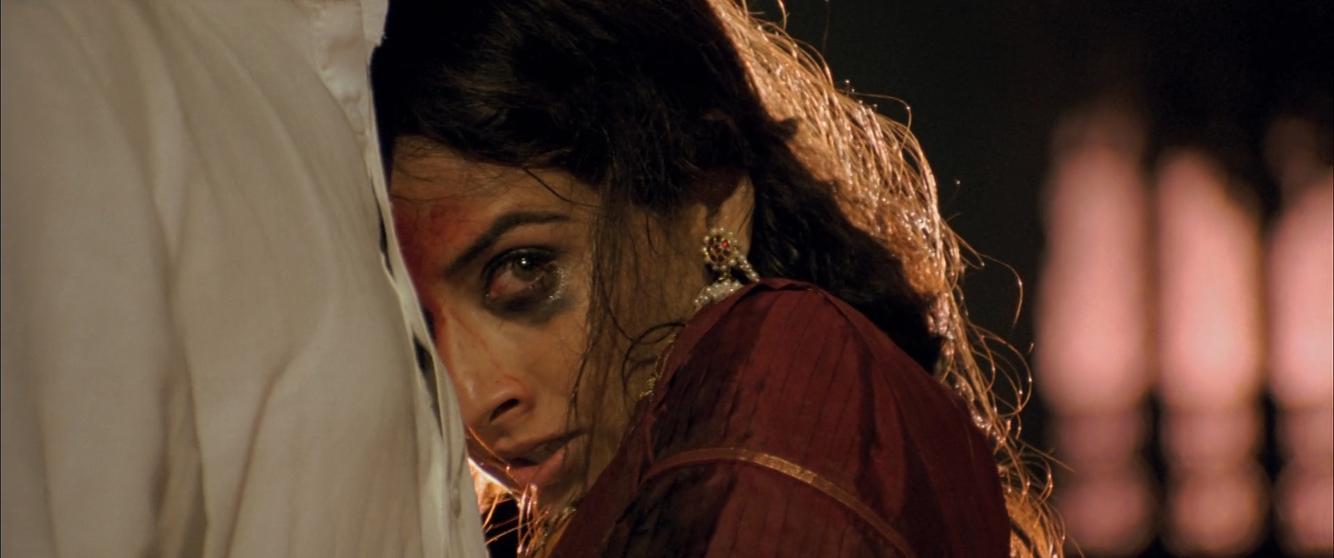Vidya Balan looking disheveled with make up smeared across her face