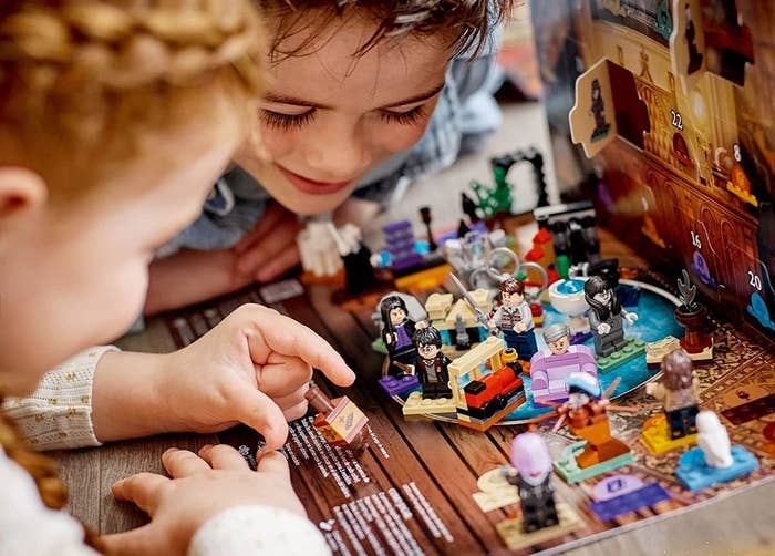 children playing with the Harry Potter figures