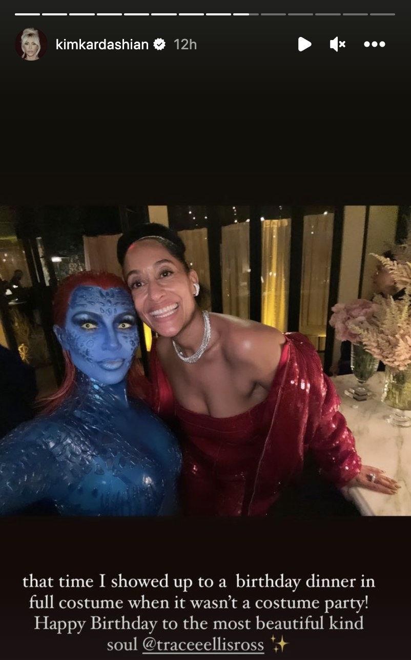 Kim wears her Mystique costume and takes a selfie with Tracee