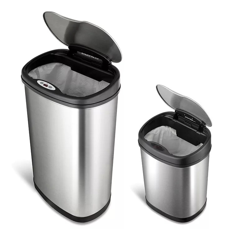 A large and small silver trash can