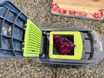 reviewer image of a wedge of purple cabbage on the dicer