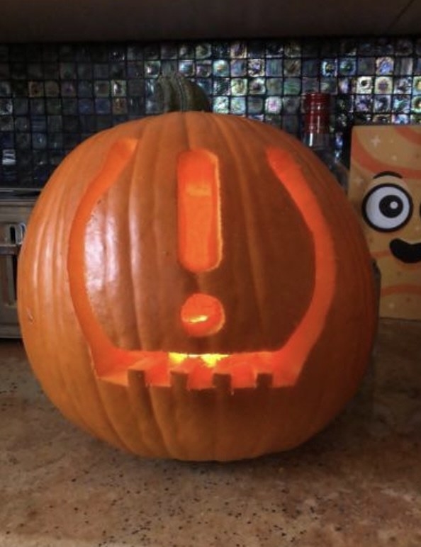 An exclamation carved into a pumpkin