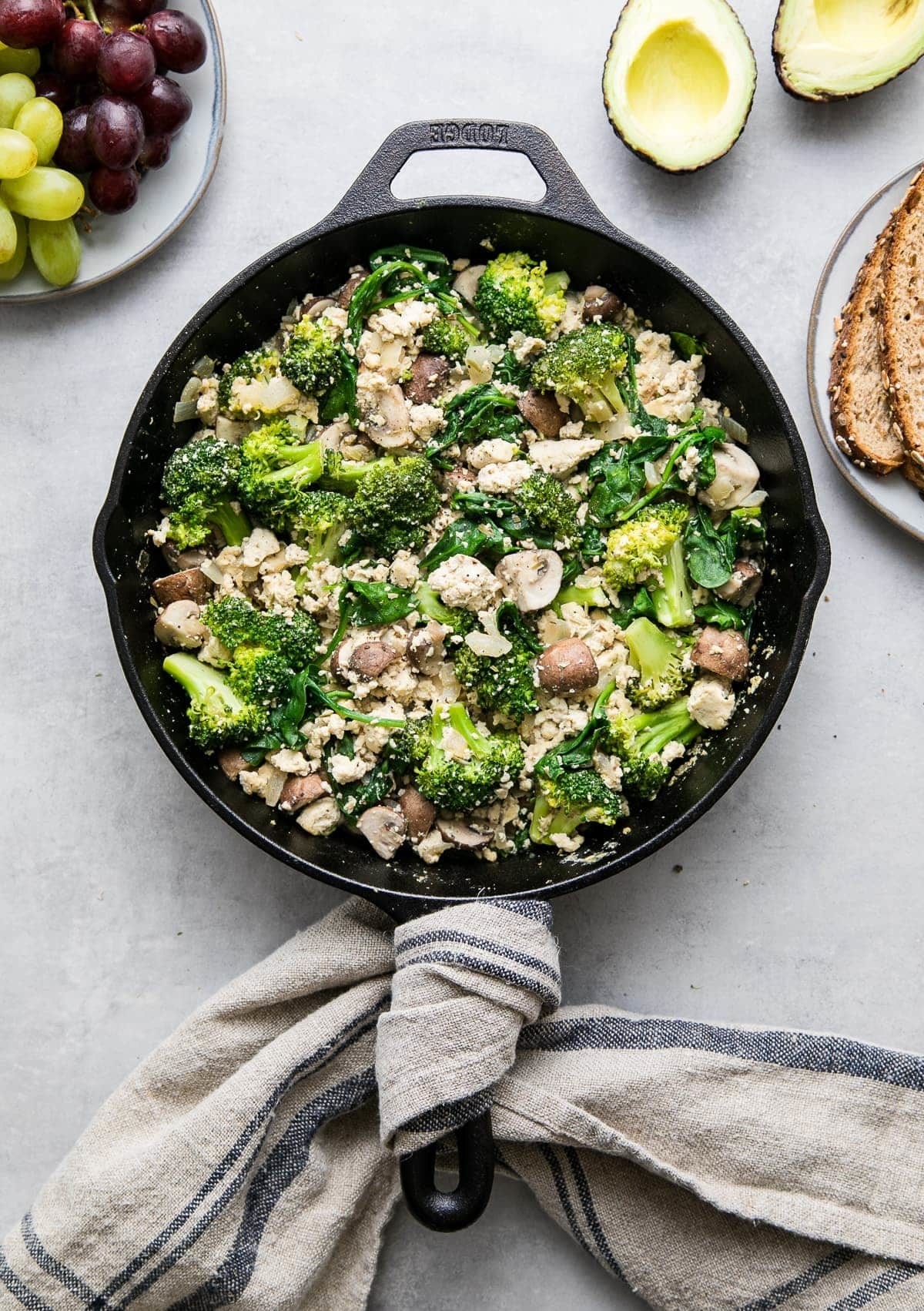 skillet with tofu, mushrooms, broccoli and spinach