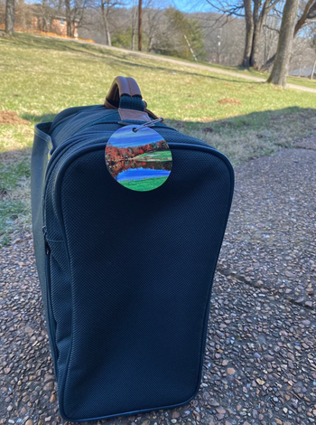 custom luggage tag on a suitcase
