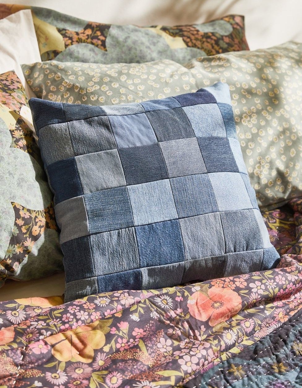 denim pillow made of multi shade patchwork squares