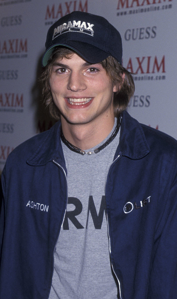Ashton Kutcher grinning