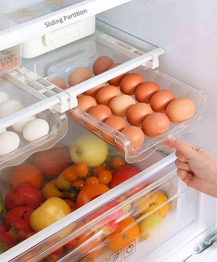 An egg shelf is shown in a fridge