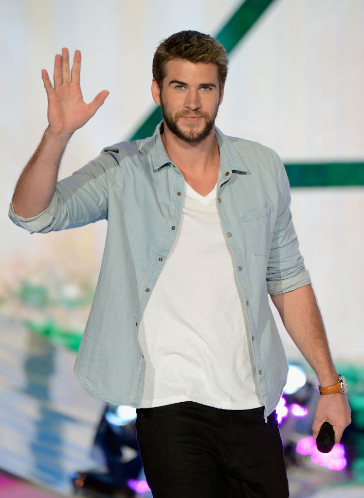 Liam Hemsworth waving