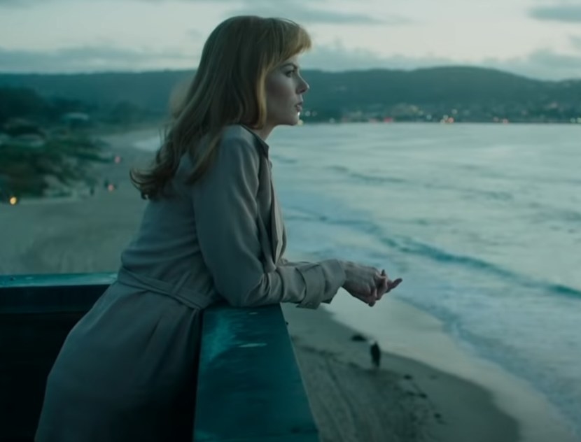 Nicole Kidman as Celeste overlooking the ocean on a balcony