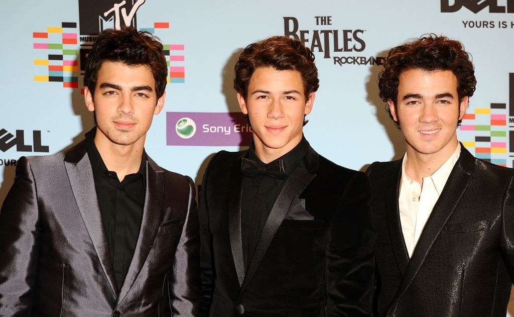 the Jonas Brothers in suits