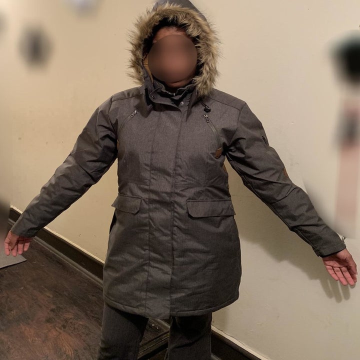 a reviewer wears the coat