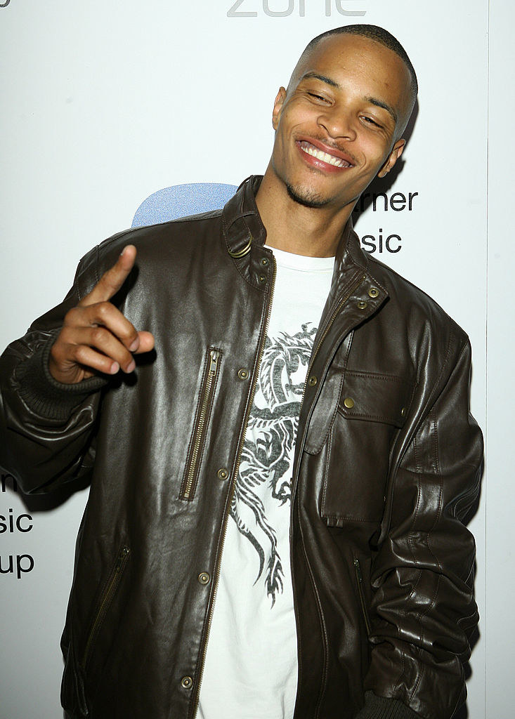 TI smiling and pointing