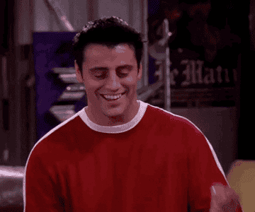 a gif of joey from friends pointing to his head and saying, &quot;not just a hat rack my friend&quot;
