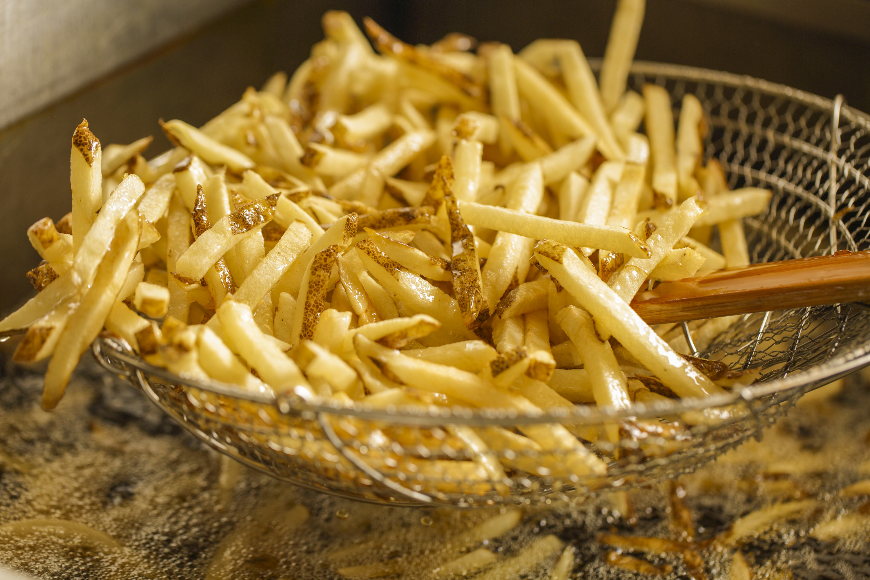 French fries in the fryer