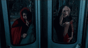 The Sanderson sisters being confused by a bus