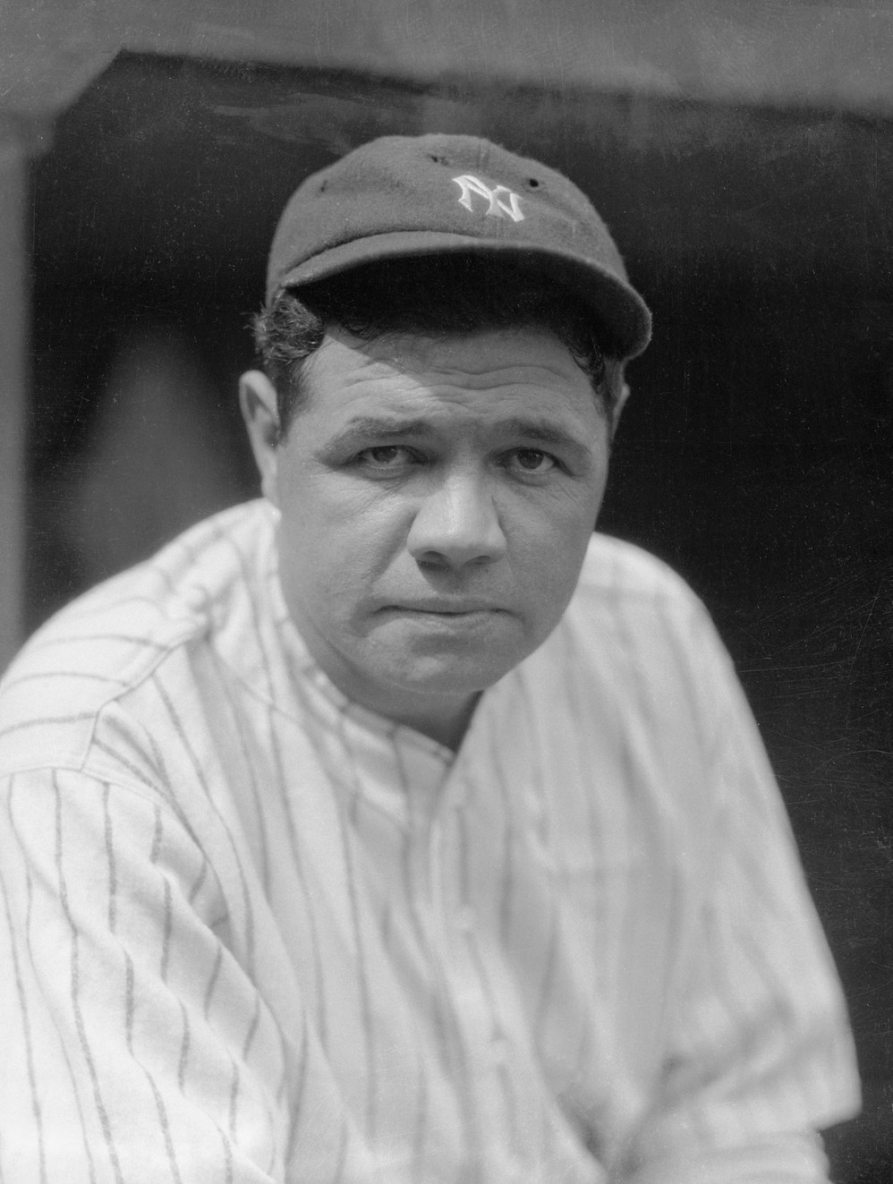 Black-and-white close-up of Babe in a baseball uniform