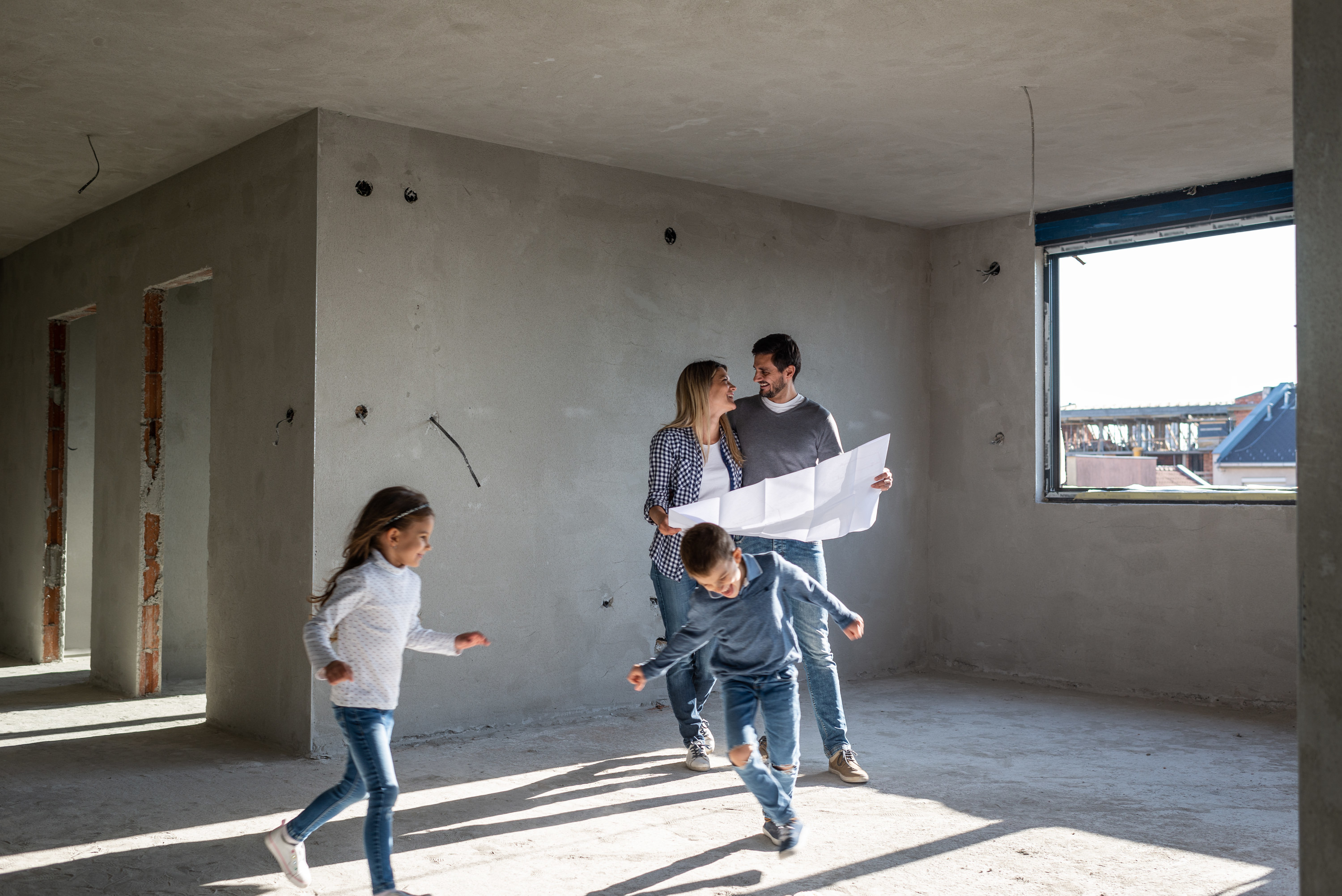 a family in a home being newly built