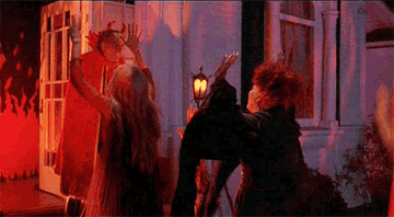 The Sanderson sisters mistaking a random for the devil