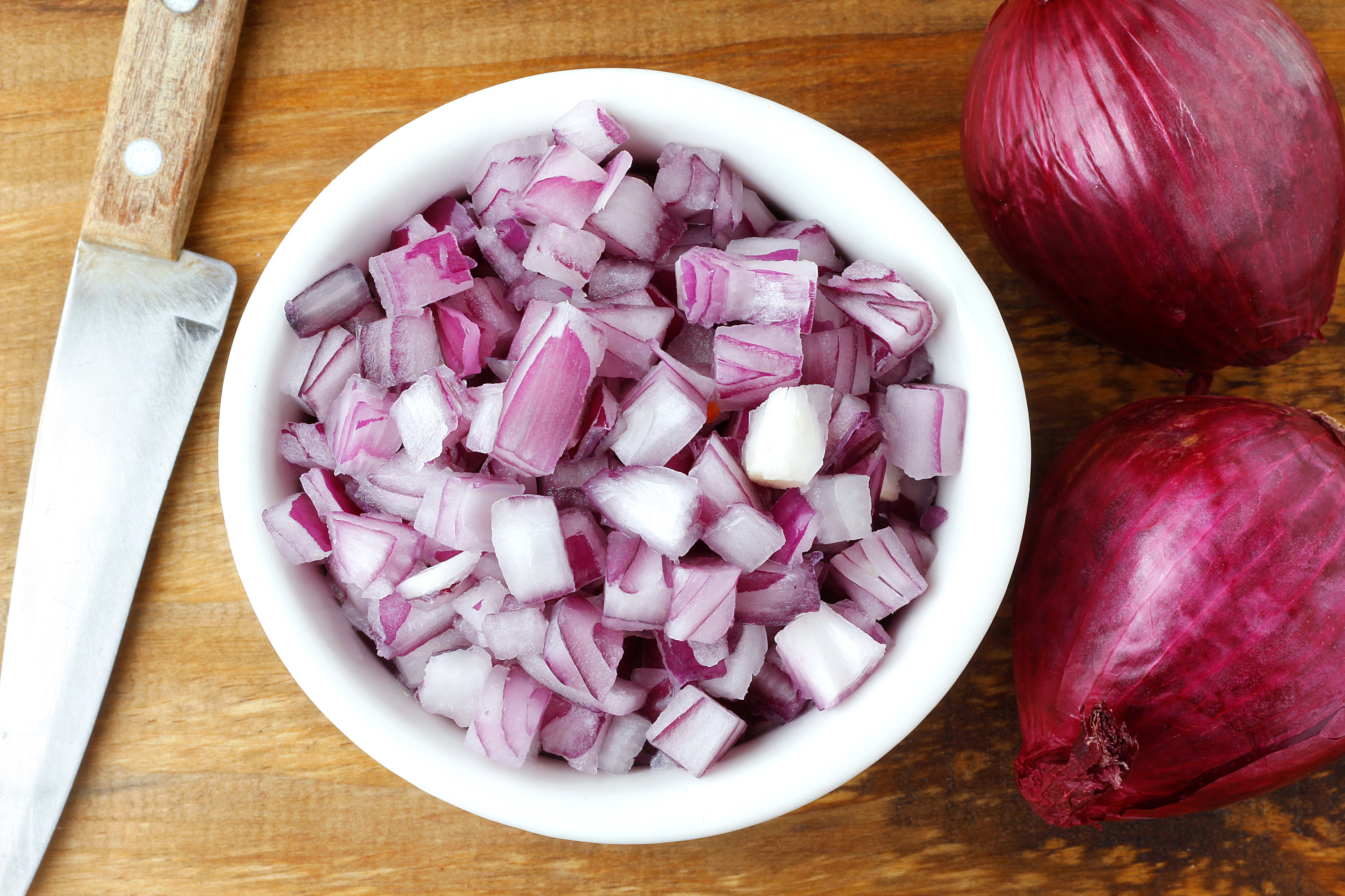Bowl of chopped red onions
