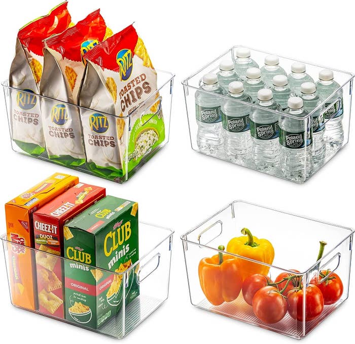 Stock photo of four clear bins with various food items in them