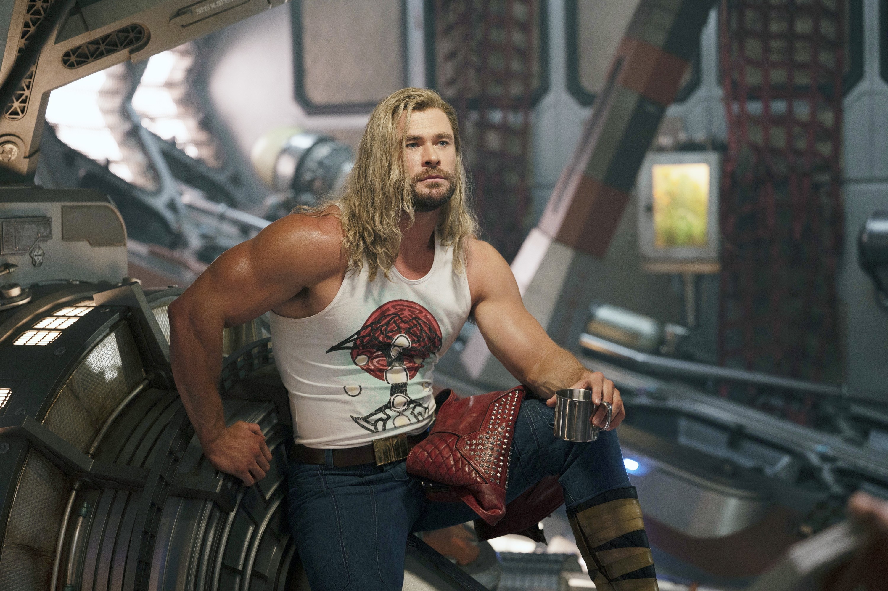 Thor in a muscle shirt and jeans