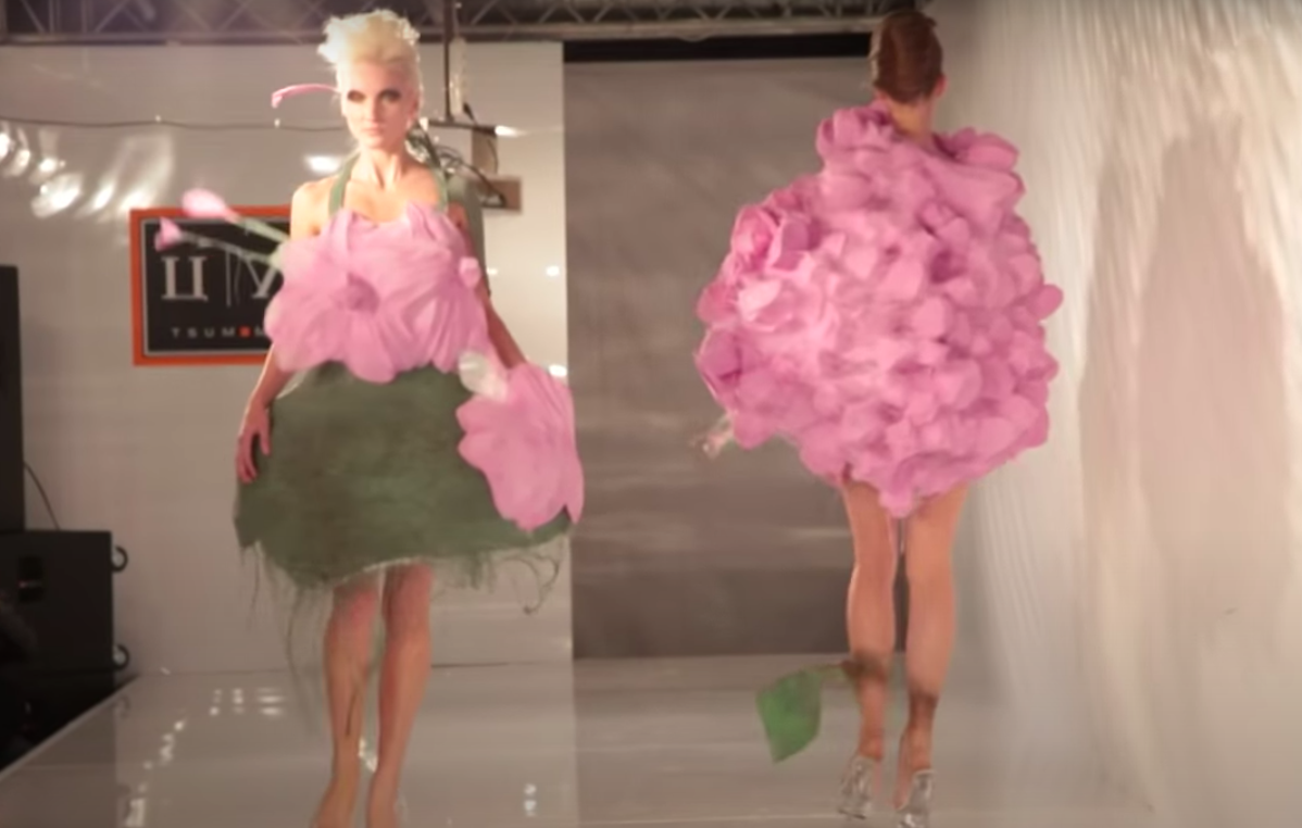 Models wearing shapeless pink and green garments