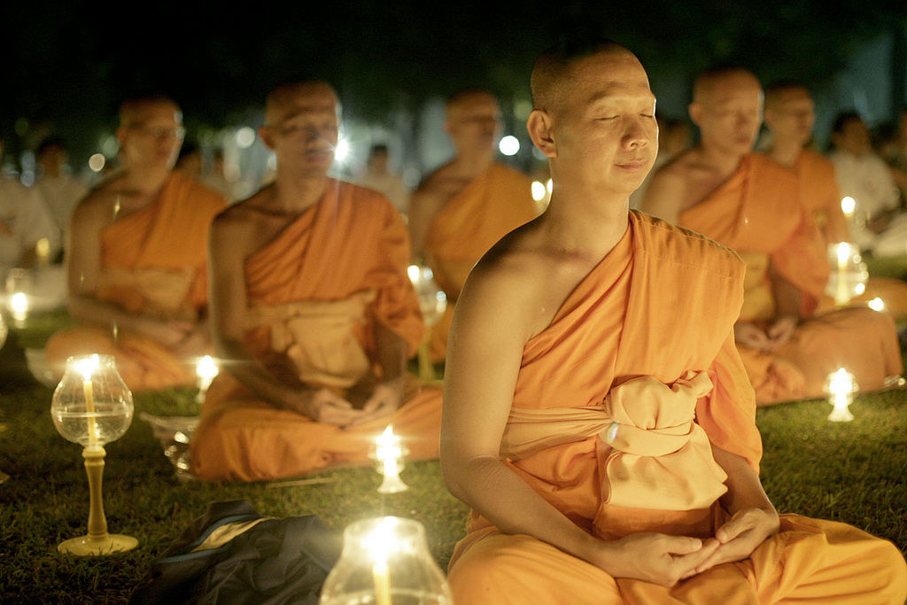 Monks sitting and meditating