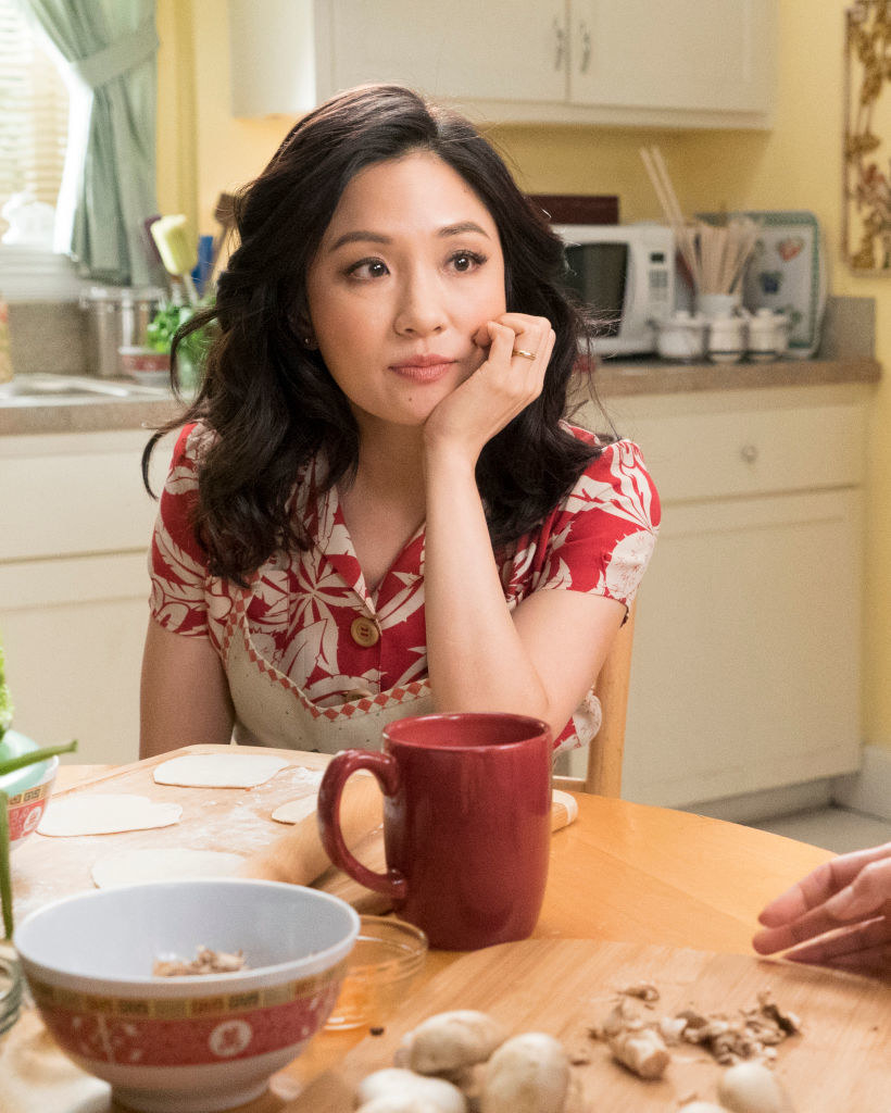 Jessica Huang sitting at the table in a kitchen