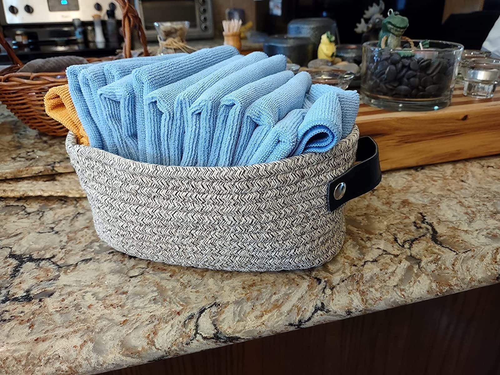 Reviewer image of basket with blue microfiber cloths in it