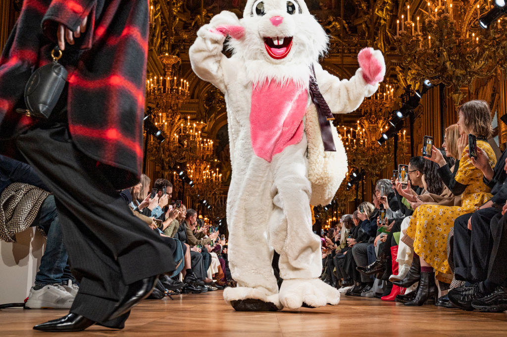 A model in a full-body rabbit costume
