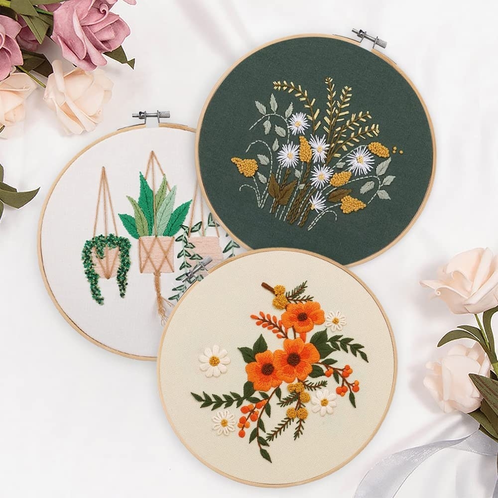 three floral embroidered circles