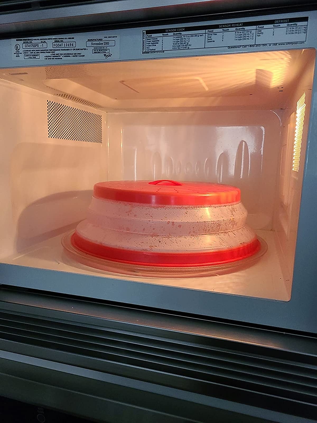 Reviewer image of red cover inside a microwave