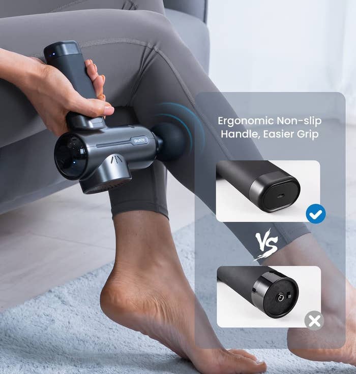 the massage gun being used on a model&#x27;s calf muscle