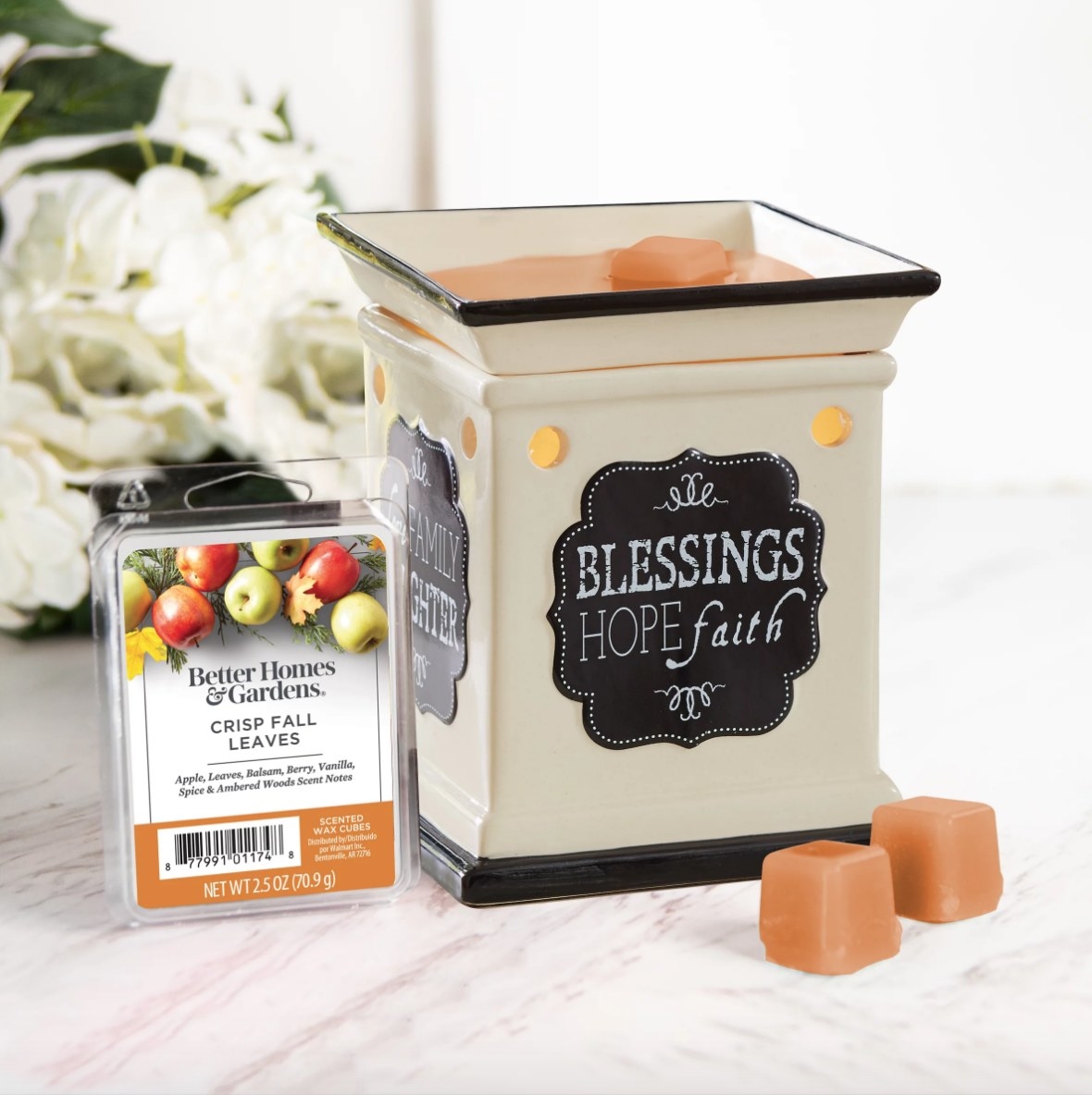 Orange scented wax cubes melting in wax burner that says &quot;blessings, hope, faith&quot;