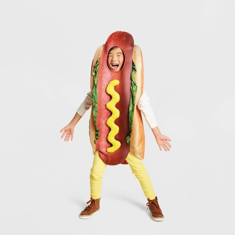 kid wearing hot dog costume
