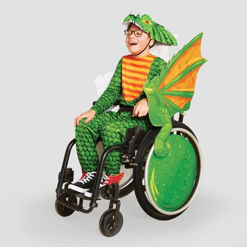 kid in dragon costume