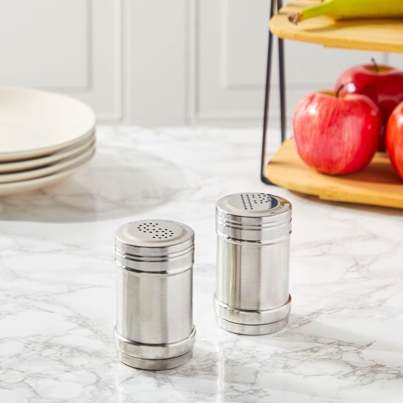 The salt and pepper shakers on a counter
