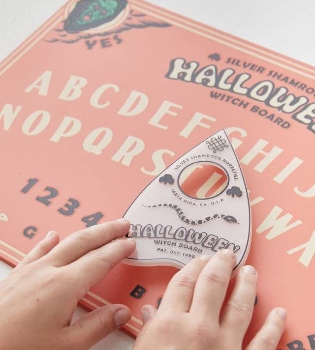 a person using the ouija board
